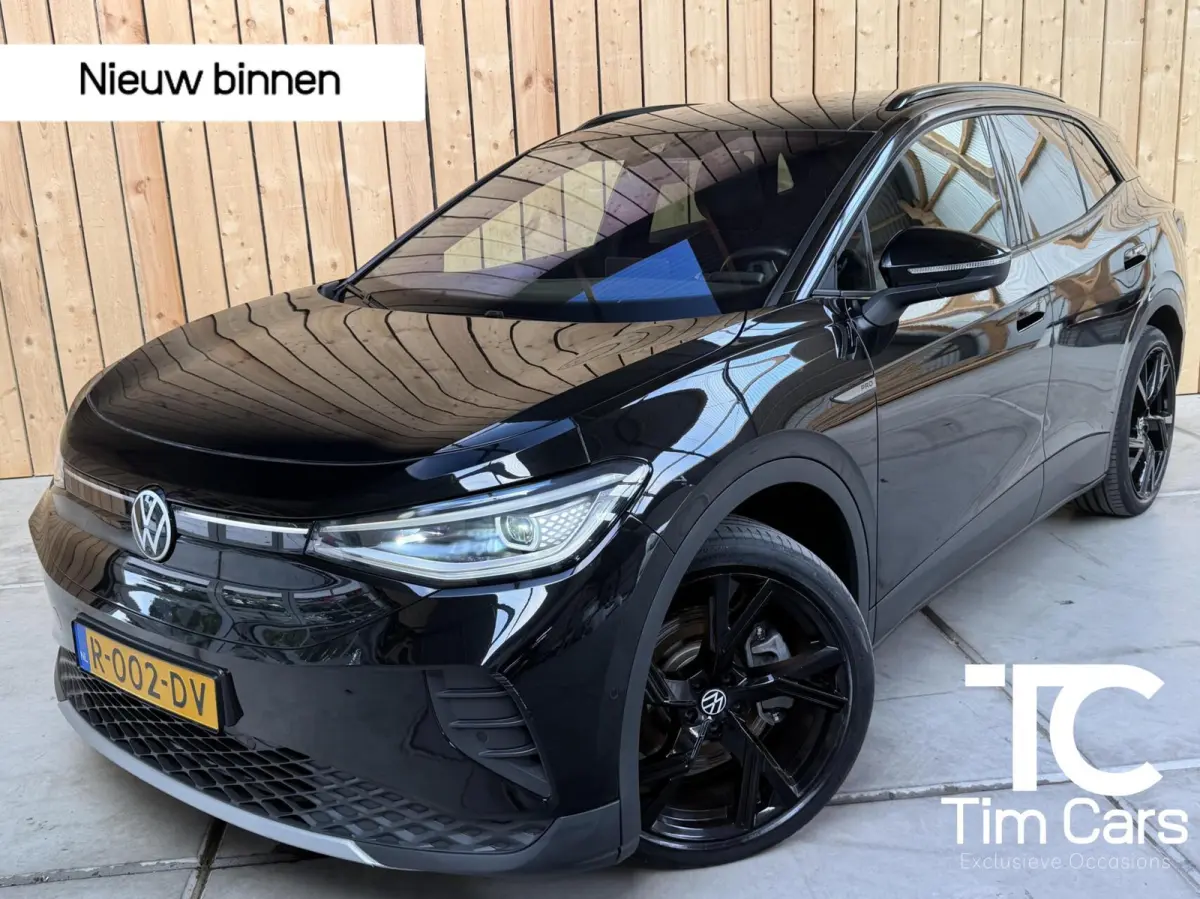 Pro 77 kWh SoH 96,56% Apple CarPlay/Android Auto | Alcantara/leer bekleding | Climate control | Cruise control adaptief | DAB ontvangst | LED verlichting | Navigatiesysteem | Sfeerverlichtin