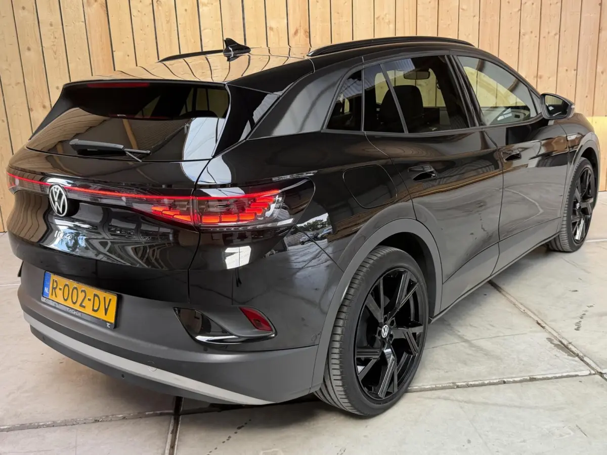 Pro 77 kWh SoH 96,56% Apple CarPlay/Android Auto | Alcantara/leer bekleding | Climate control | Cruise control adaptief | DAB ontvangst | LED verlichting | Navigatiesysteem | Sfeerverlichtin