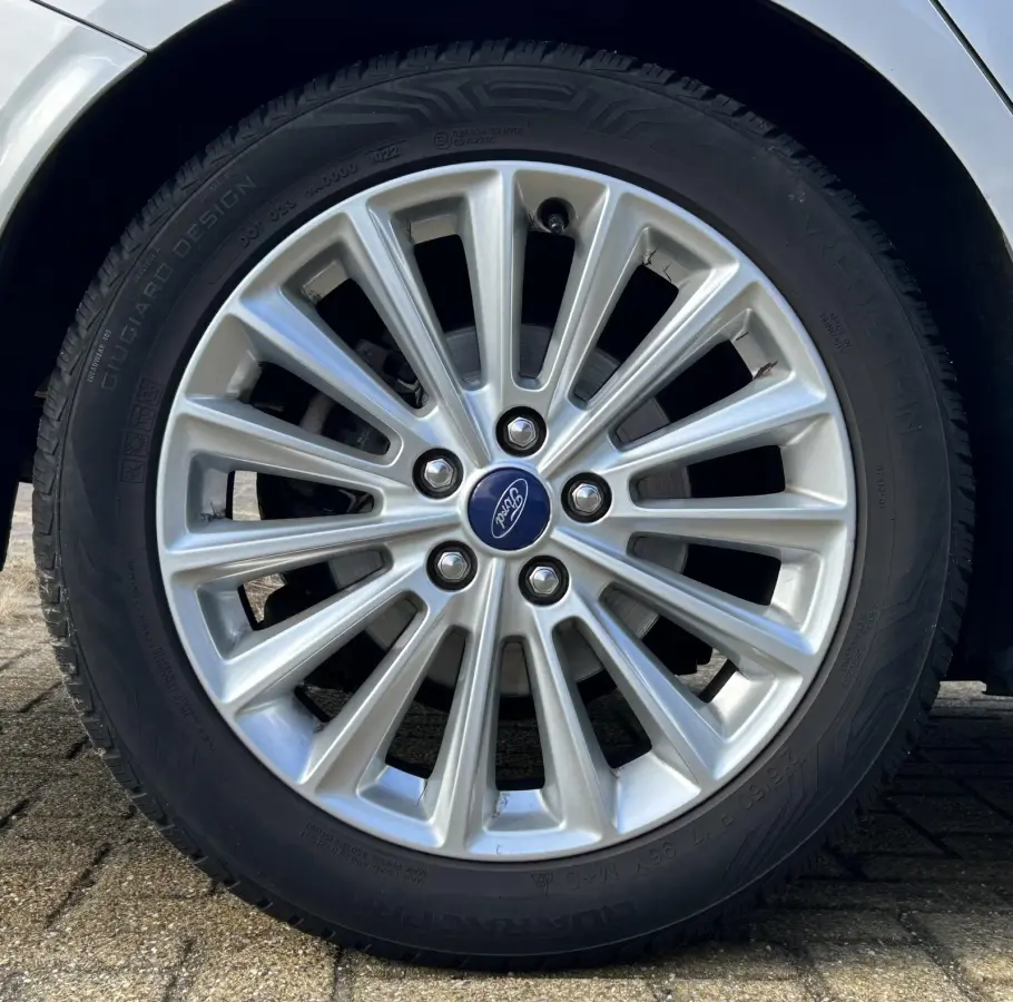 1.0 Titanium 125PK | NL AUTO | NAP | Onderhoudshistorie | Trekhaak | Navigatie | Climate Control | Cruise Control | 17 Inch Lichtmetalen Velgen | Parkeersensoren Voor en Achter | 2 Sleutels 