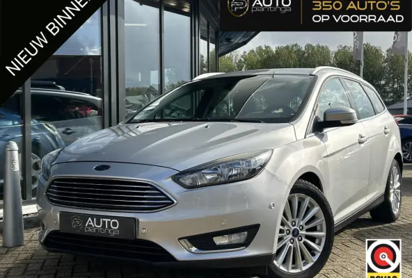 1.0 Titanium 125PK | NL AUTO | NAP | Onderhoudshistorie | Trekhaak | Navigatie | Climate Control | Cruise Control | 17 Inch Lichtmetalen Velgen | Parkeersensoren Voor en Achter | 2 Sleutels 