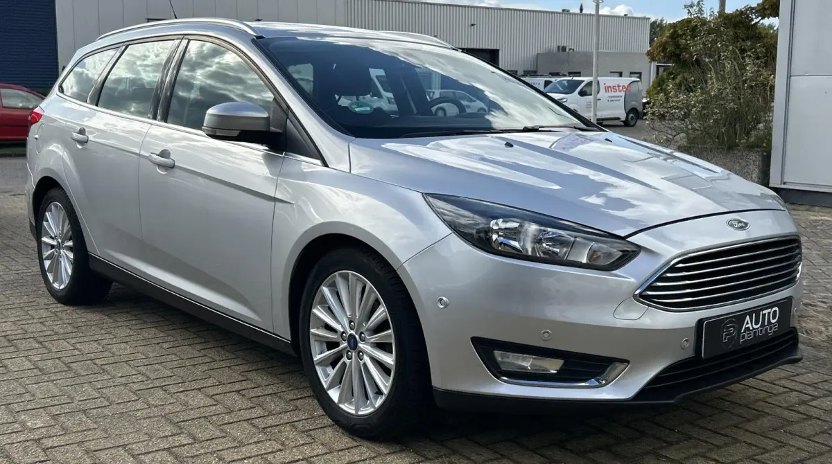 1.0 Titanium 125PK | NL AUTO | NAP | Onderhoudshistorie | Trekhaak | Navigatie | Climate Control | Cruise Control | 17 Inch Lichtmetalen Velgen | Parkeersensoren Voor en Achter | 2 Sleutels 