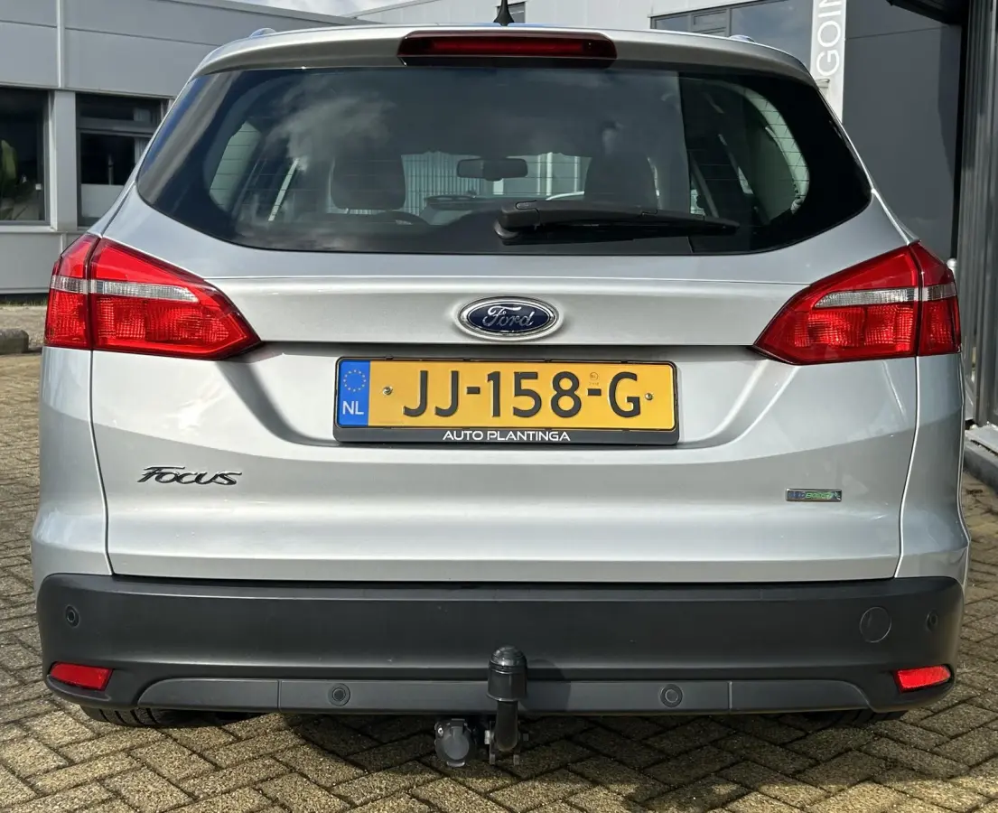 1.0 Titanium 125PK | NL AUTO | NAP | Onderhoudshistorie | Trekhaak | Navigatie | Climate Control | Cruise Control | 17 Inch Lichtmetalen Velgen | Parkeersensoren Voor en Achter | 2 Sleutels 