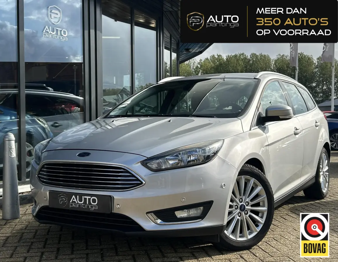 1.0 Titanium 125PK | NL AUTO | NAP | Onderhoudshistorie | Trekhaak | Navigatie | Climate Control | Cruise Control | 17 Inch Lichtmetalen Velgen | Parkeersensoren Voor en Achter | 2 Sleutels 