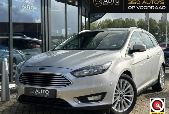 1.0 Titanium 125PK | NL AUTO | NAP | Onderhoudshistorie | Trekhaak | Navigatie | Climate Control | Cruise Control | 17 Inch Lichtmetalen Velgen | Parkeersensoren Voor en Achter | 2 Sleutels 