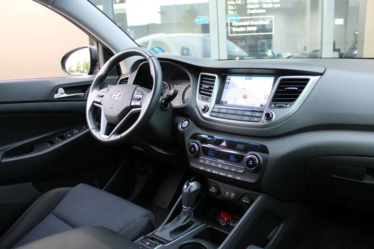 1.6 T-GDi Premium 4WD | Achteruitrijcamera | Keyless entry | Trekhaak