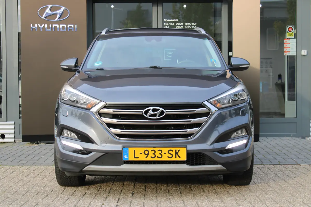 1.6 T-GDi Premium 4WD | Achteruitrijcamera | Keyless entry | Trekhaak