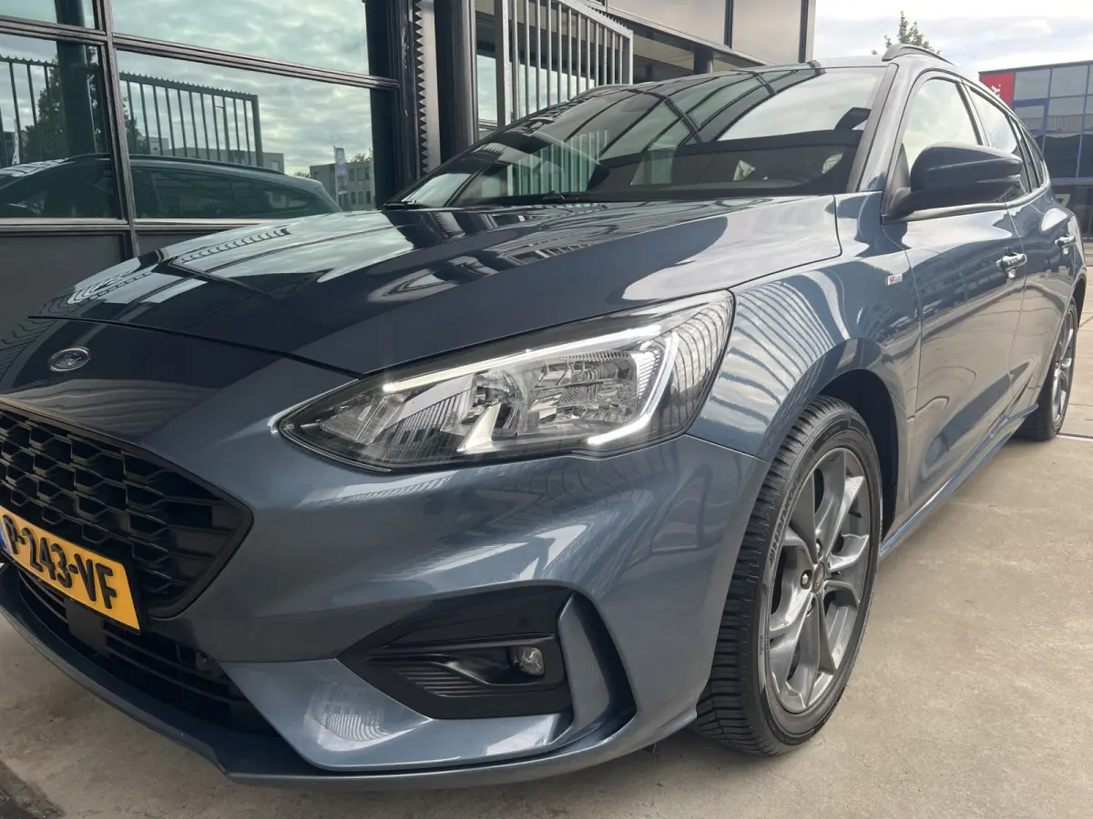 1.0 EcoBoost ST Line Business | NAVI | CARPLAY/ANDROID | CRUISE CONTROL | LMV 17'' | PDC V+A | STOEL/STUURVERWARMING | AIRCO | DAB | BLUETOOTH | ALL-SEASON BANDEN