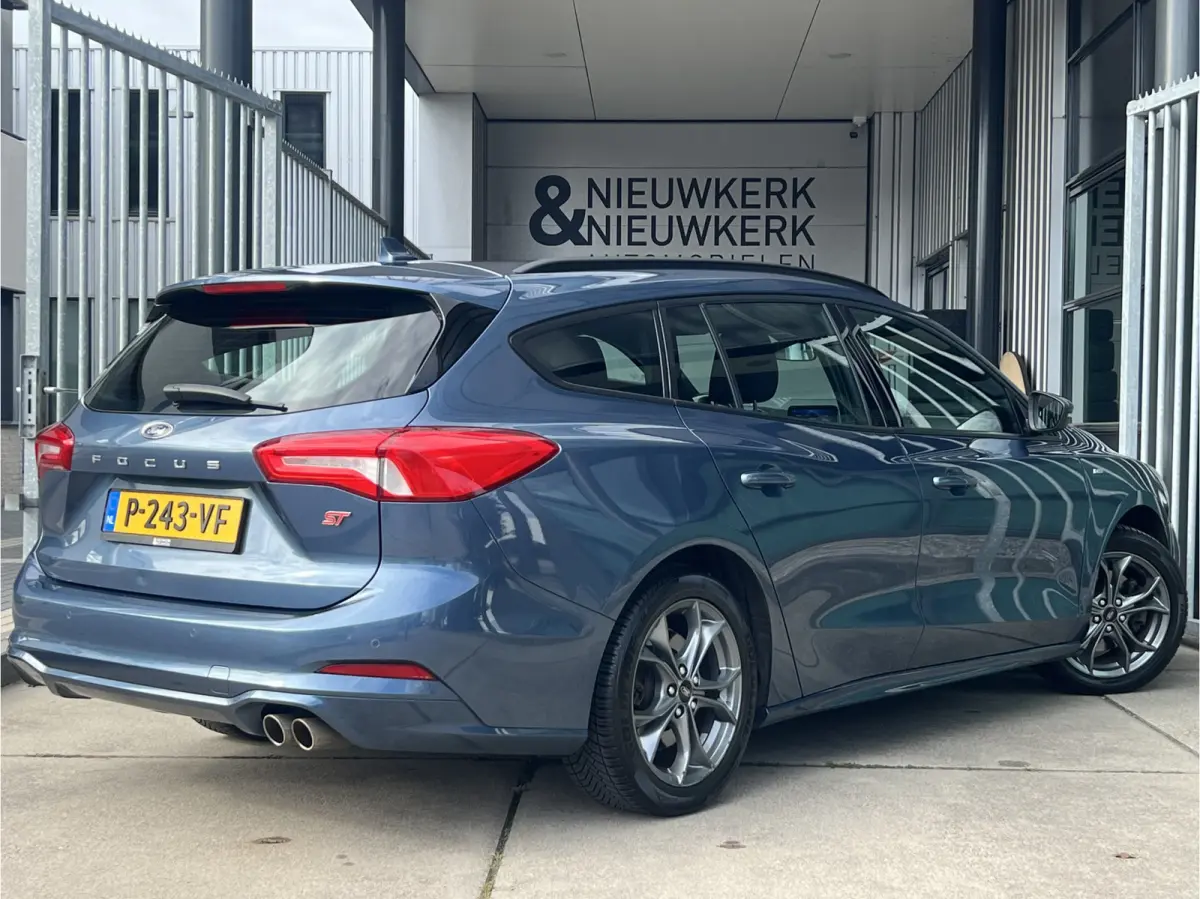 1.0 EcoBoost ST Line Business | NAVI | CARPLAY/ANDROID | CRUISE CONTROL | LMV 17'' | PDC V+A | STOEL/STUURVERWARMING | AIRCO | DAB | BLUETOOTH | ALL-SEASON BANDEN