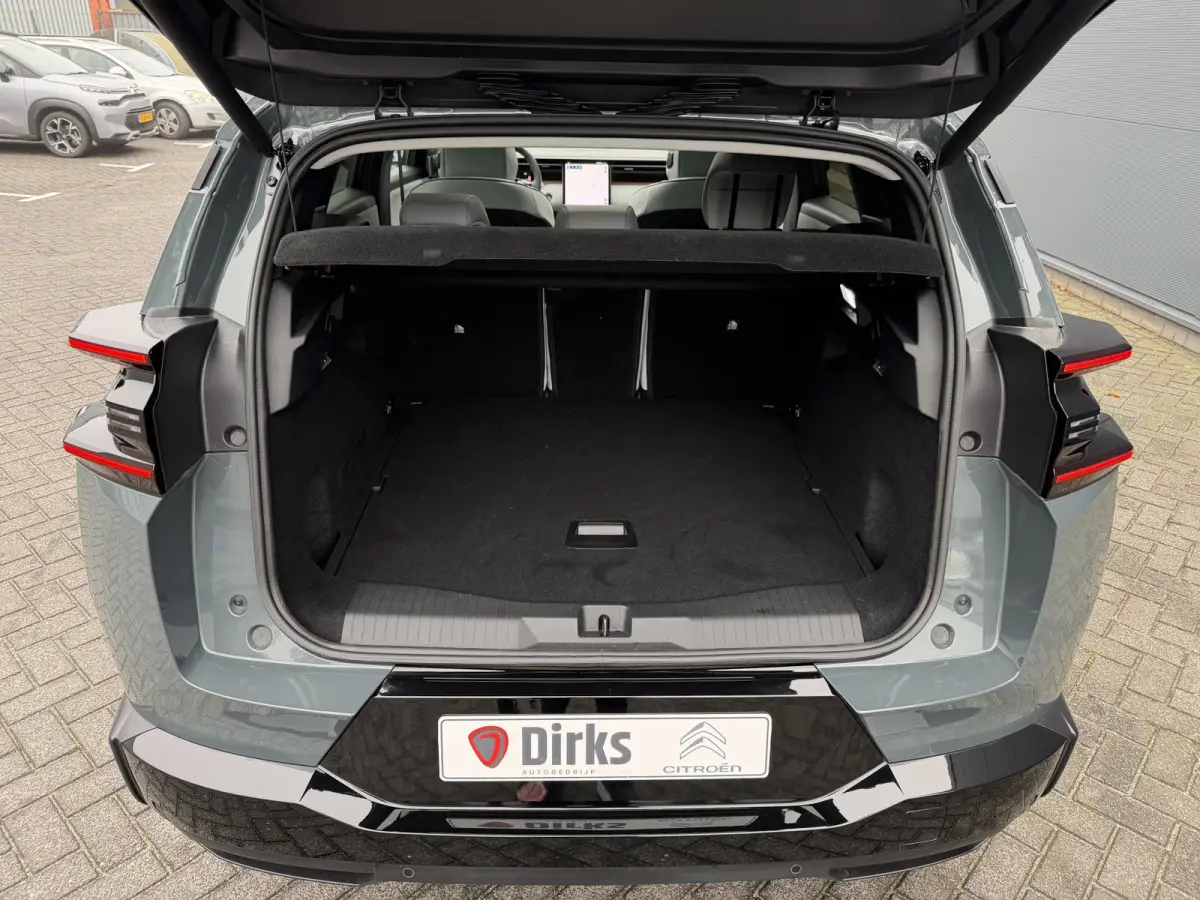 Max Comfort Range 74 kWh (Elektrisch Schuifdak - Leder incl verwarming/koeling/massage/geheugen - Elektrische Klep - 360gr Camera - Adaptieve Cruise Controle - Warmtepomp)
