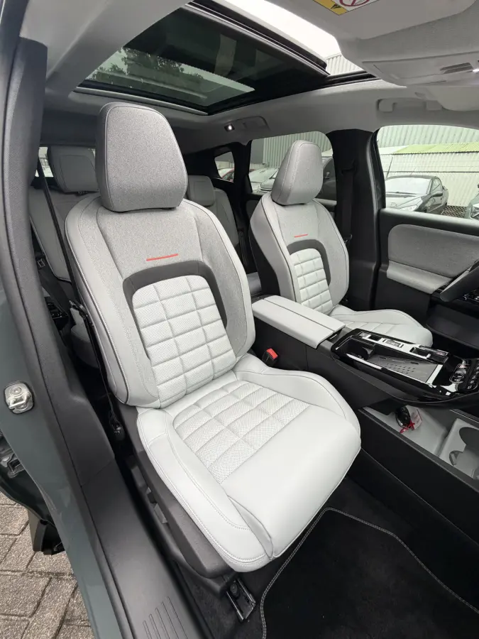 Max Comfort Range 74 kWh (Elektrisch Schuifdak - Leder incl verwarming/koeling/massage/geheugen - Elektrische Klep - 360gr Camera - Adaptieve Cruise Controle - Warmtepomp)