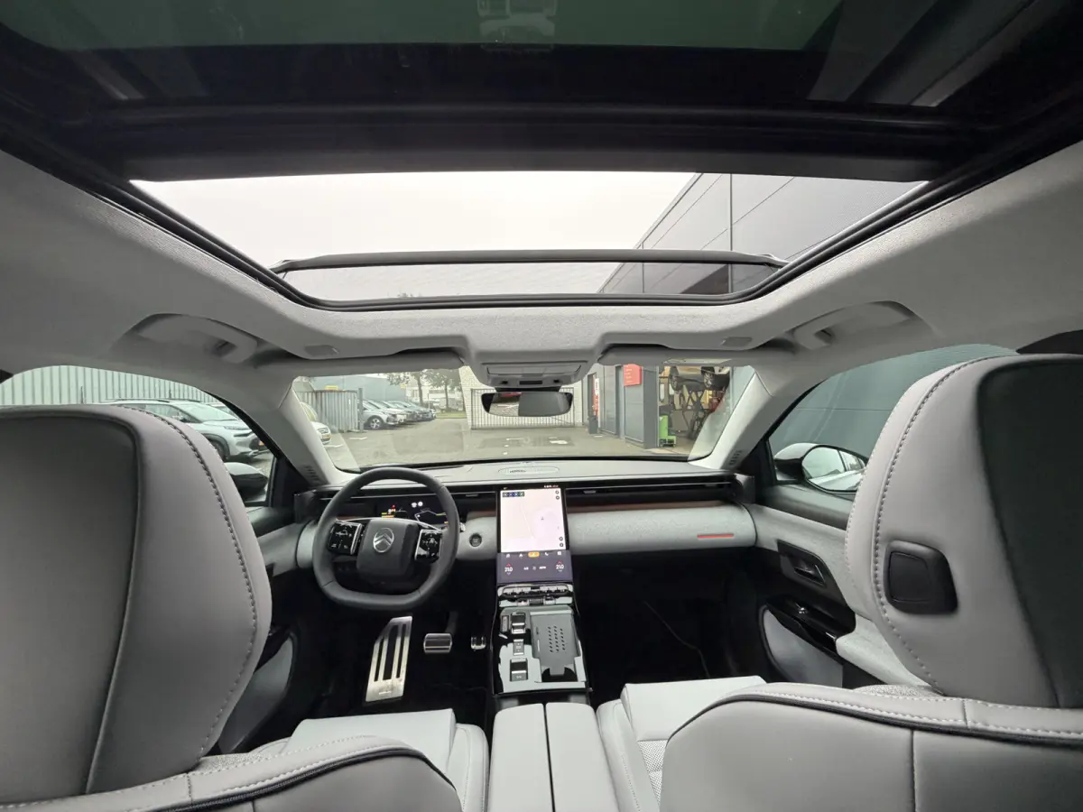 Max Comfort Range 74 kWh (Elektrisch Schuifdak - Leder incl verwarming/koeling/massage/geheugen - Elektrische Klep - 360gr Camera - Adaptieve Cruise Controle - Warmtepomp)