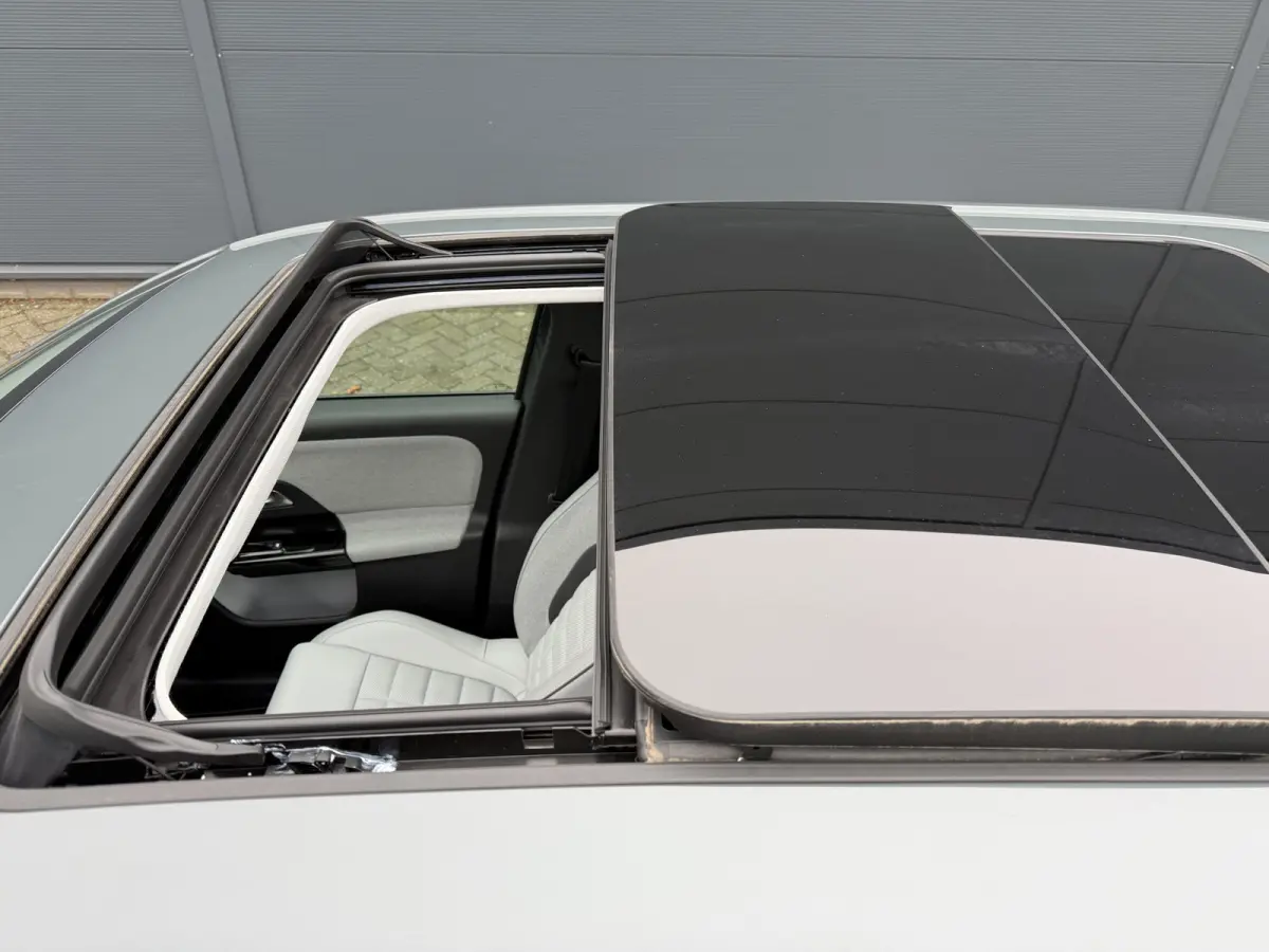 Max Comfort Range 74 kWh (Elektrisch Schuifdak - Leder incl verwarming/koeling/massage/geheugen - Elektrische Klep - 360gr Camera - Adaptieve Cruise Controle - Warmtepomp)