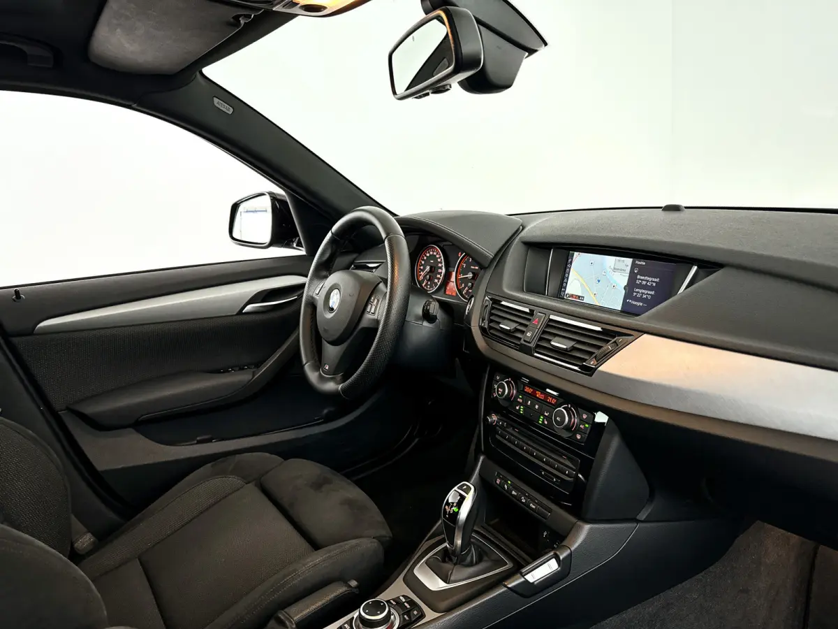 xDrive28i High Executive | Panoramadak | Park assist | Cruise control