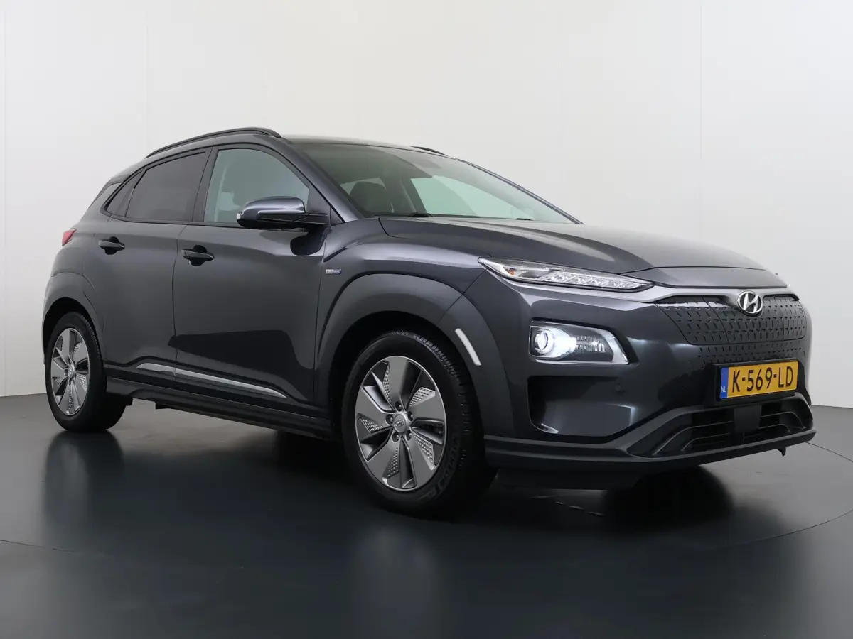 Limited 64kWh | 1ste eigenaar | ACCU 98% | LEER | Electrische stoelen | Dodehoekdetectie | AUTOMAAT