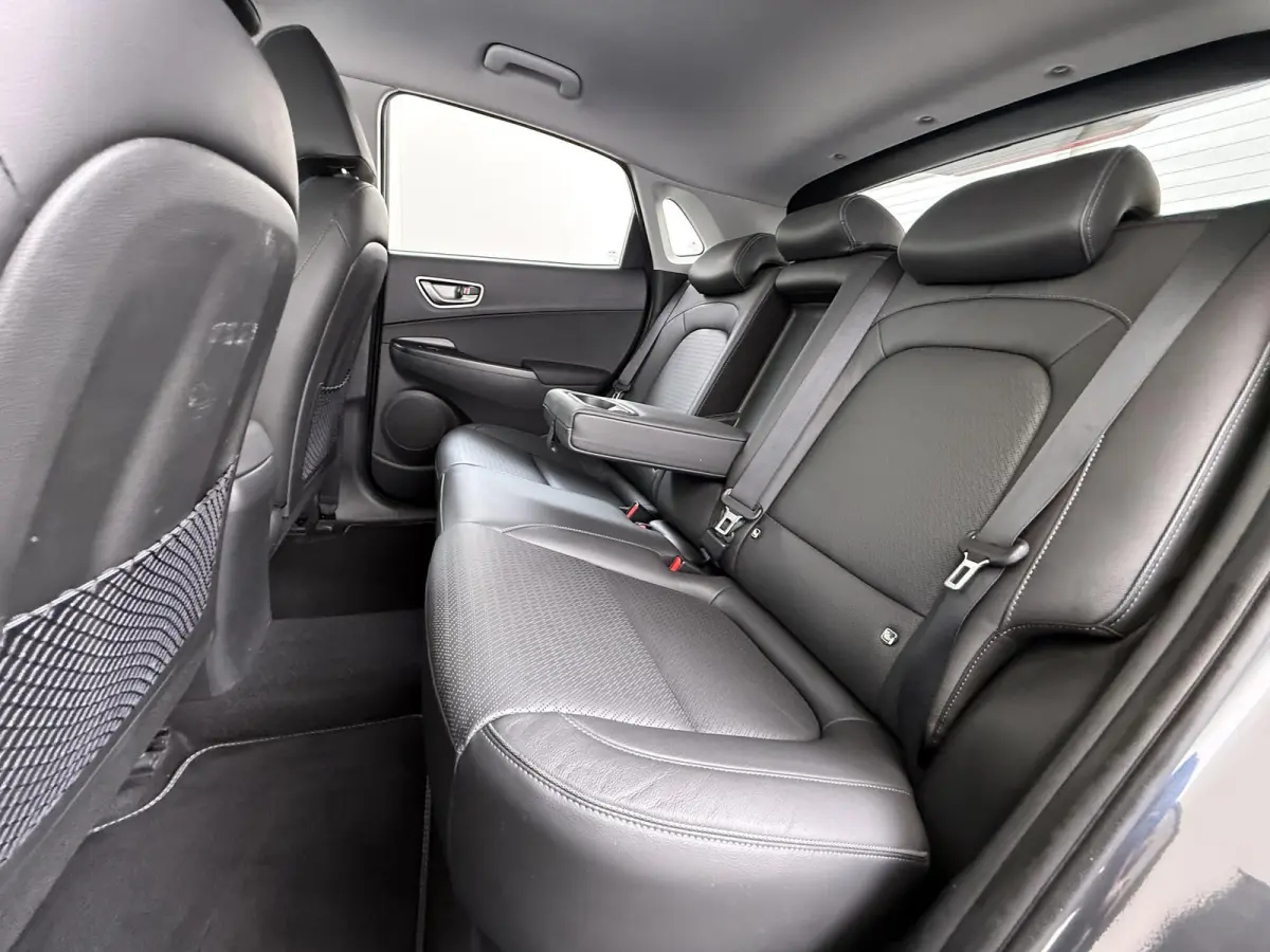 Limited 64kWh | 1ste eigenaar | ACCU 98% | LEER | Electrische stoelen | Dodehoekdetectie | AUTOMAAT