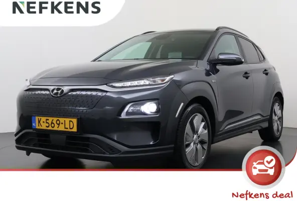 Limited 64kWh | 1ste eigenaar | ACCU 98% | LEER | Electrische stoelen | Dodehoekdetectie | AUTOMAAT