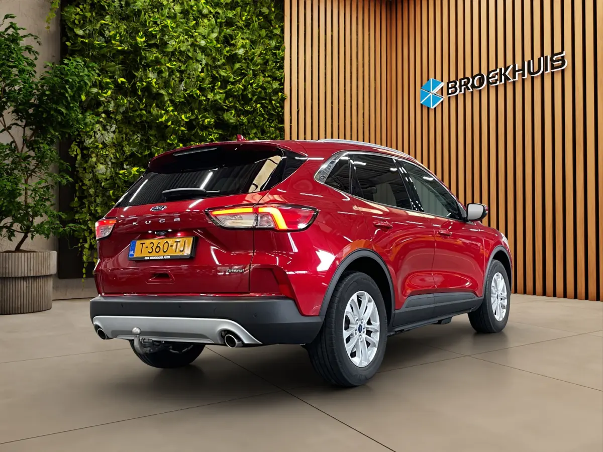 2.5 PHEV Titanium Stoel- stuurverw | Cruise control | Carplay | Achteruitrij camera | Elektrische trekhaak