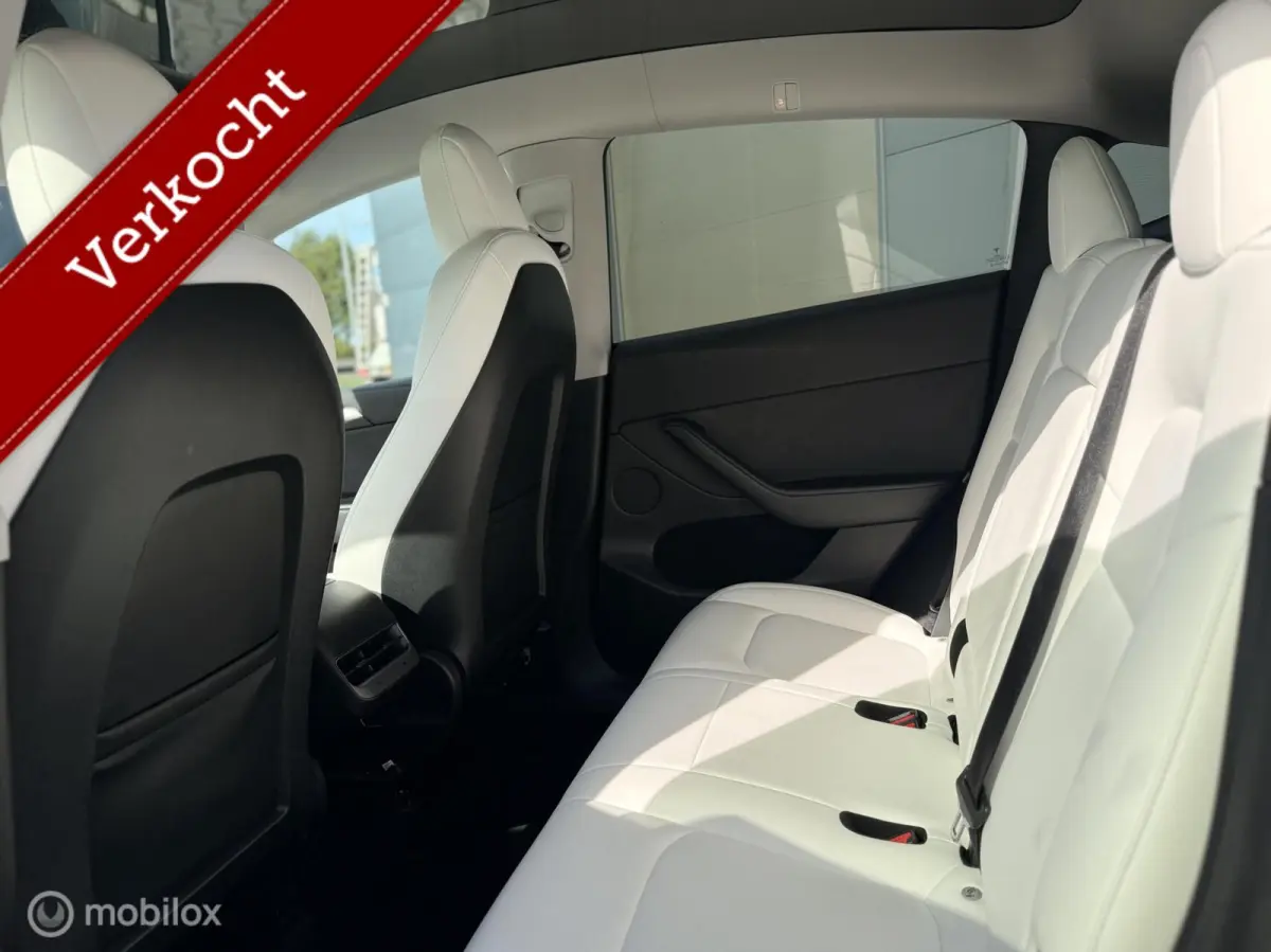 Long Range AWD | 75 kWh | SOH 88% | Warmtepomp | 20" | Wit Leder