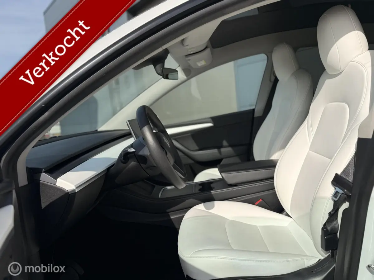 Long Range AWD | 75 kWh | SOH 88% | Warmtepomp | 20" | Wit Leder