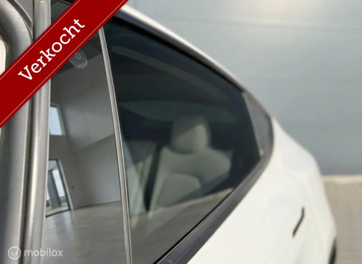Long Range AWD | 75 kWh | SOH 88% | Warmtepomp | 20" | Wit Leder
