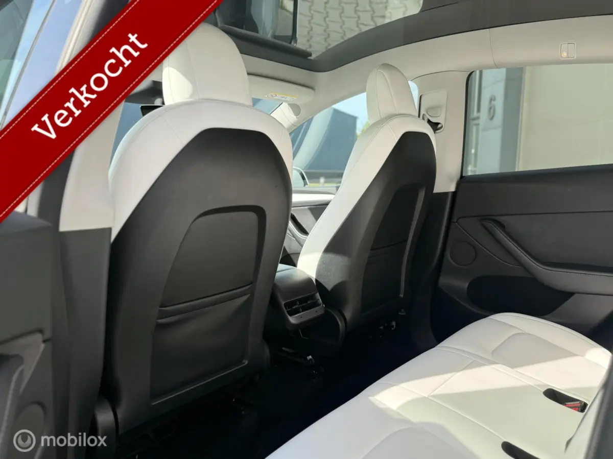 Long Range AWD | 75 kWh | SOH 88% | Warmtepomp | 20" | Wit Leder