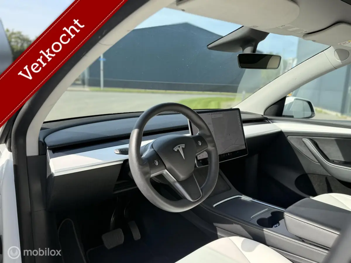Long Range AWD | 75 kWh | SOH 88% | Warmtepomp | 20" | Wit Leder