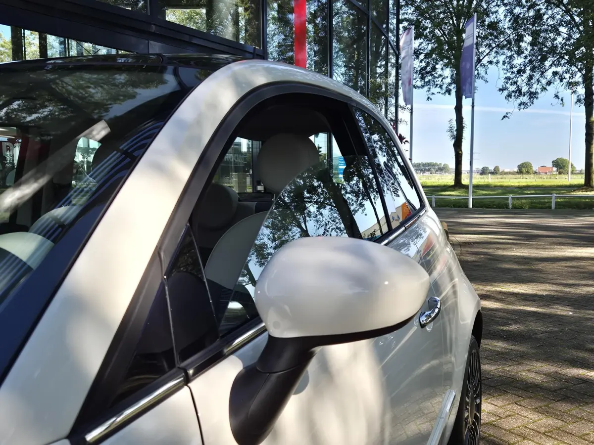 0.9 TwinAir Turbo Lounge | Panoramadak | Navigatie | Climate Control | Navigatie | Parkeersensoren | Licht metalen velgen