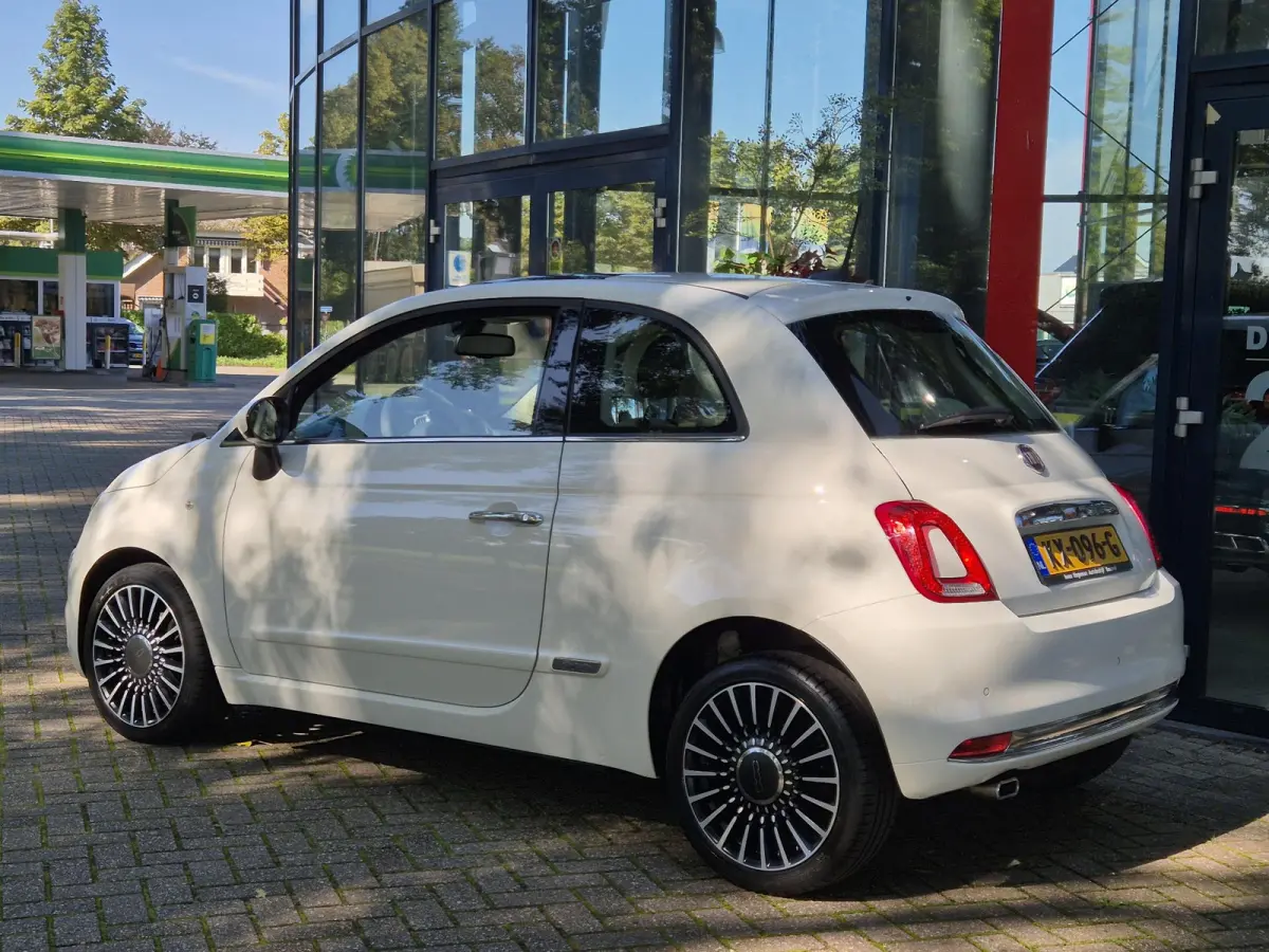 0.9 TwinAir Turbo Lounge | Panoramadak | Navigatie | Climate Control | Navigatie | Parkeersensoren | Licht metalen velgen