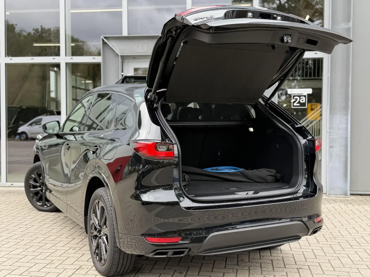 2.5 e-SkyActiv PHEV Homura Plus Black |Pano|Leer|Memory|Ventilatie|Bose|HUD|