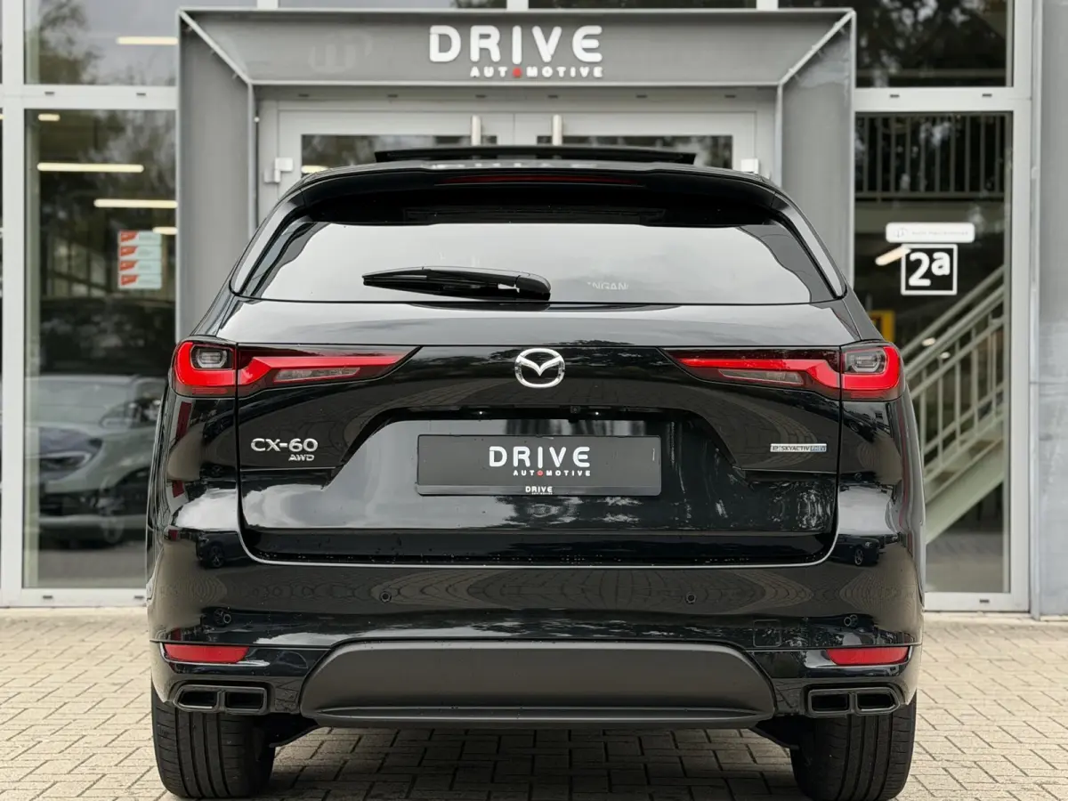 2.5 e-SkyActiv PHEV Homura Plus Black |Pano|Leer|Memory|Ventilatie|Bose|HUD|