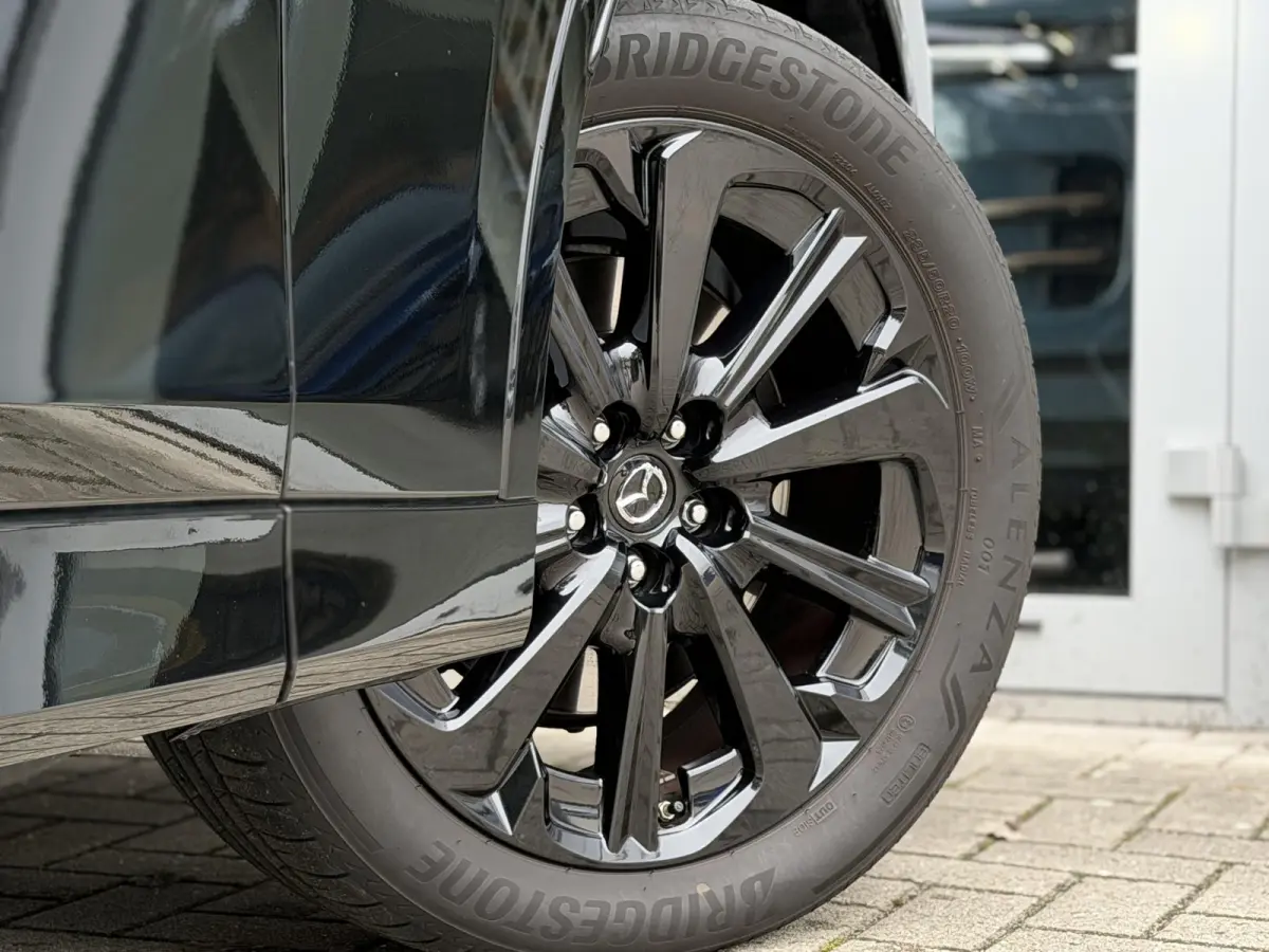 2.5 e-SkyActiv PHEV Homura Plus Black |Pano|Leer|Memory|Ventilatie|Bose|HUD|
