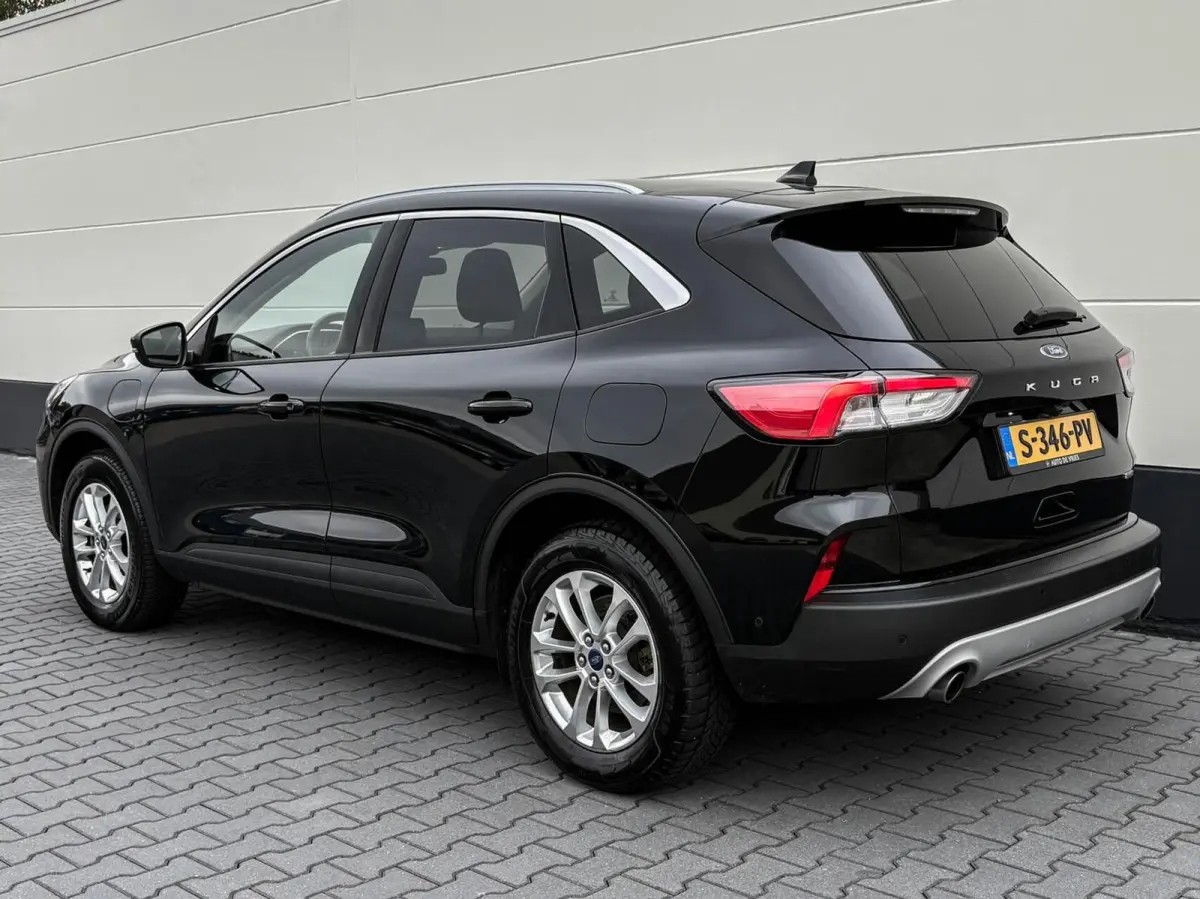 2.5 PHEV 225pk Titanium | Navigatie | Assist pakket | Camera | Trekhaak