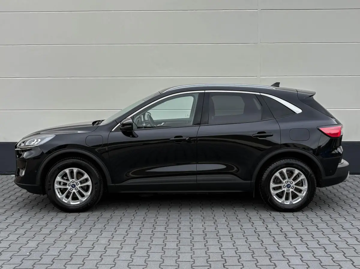 2.5 PHEV 225pk Titanium | Navigatie | Assist pakket | Camera | Trekhaak