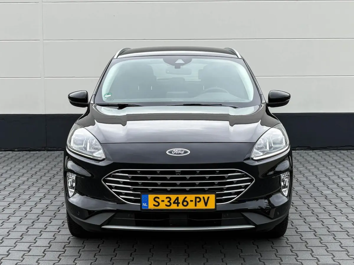 2.5 PHEV 225pk Titanium | Navigatie | Assist pakket | Camera | Trekhaak