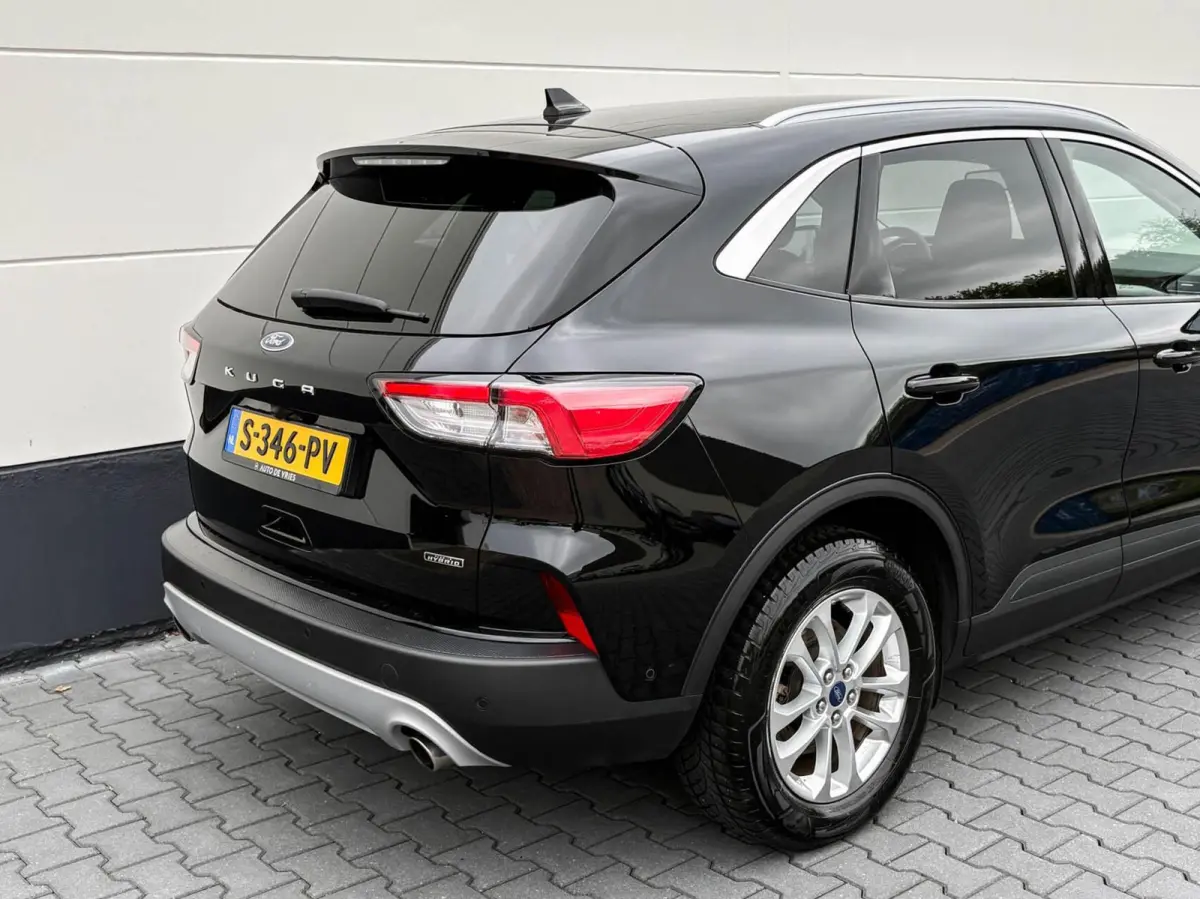 2.5 PHEV 225pk Titanium | Navigatie | Assist pakket | Camera | Trekhaak