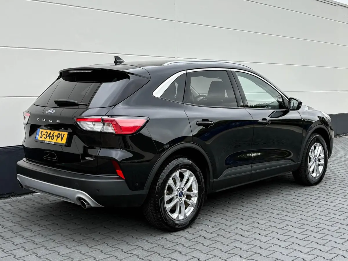 2.5 PHEV 225pk Titanium | Navigatie | Assist pakket | Camera | Trekhaak