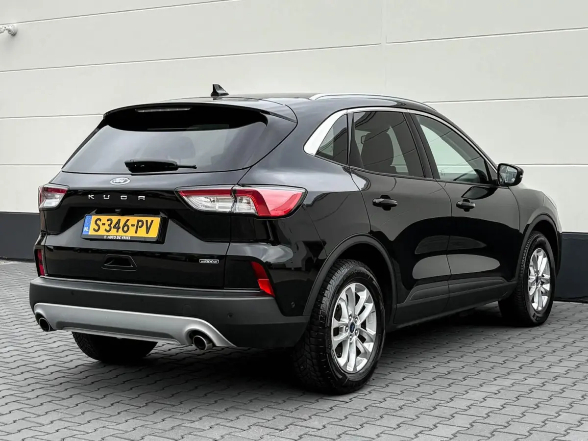 2.5 PHEV 225pk Titanium | Navigatie | Assist pakket | Camera | Trekhaak