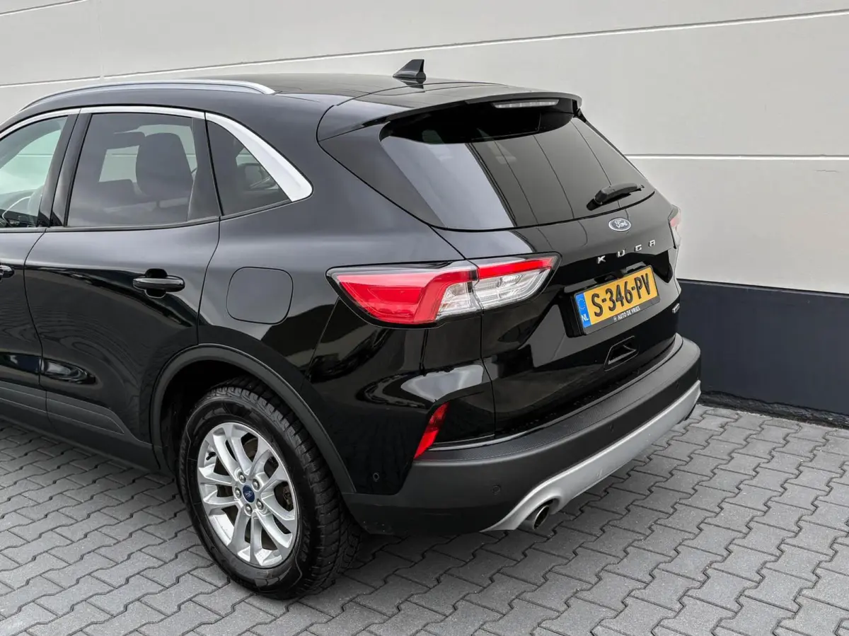 2.5 PHEV 225pk Titanium | Navigatie | Assist pakket | Camera | Trekhaak