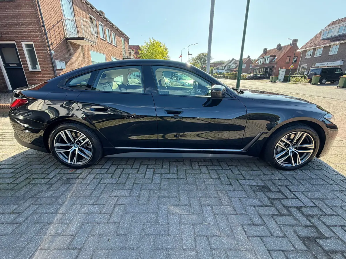 EDrive40 High Executive 84 kWh, NL-auto, SOH 96.6%, Lederen bekleding, Laser Lights,M-Stuur