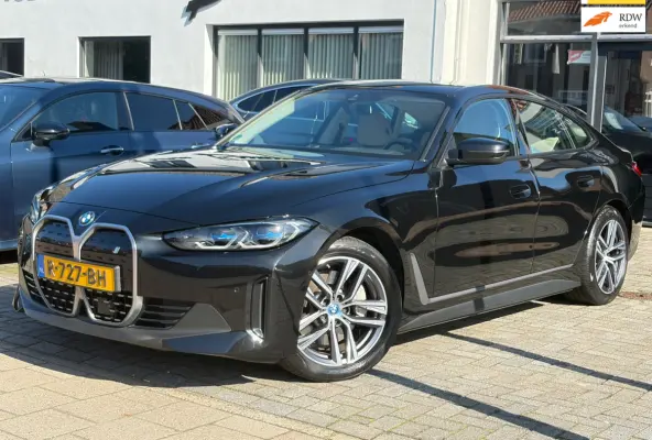 EDrive40 High Executive 84 kWh, NL-auto, SOH 96.6%, Lederen bekleding, Laser Lights,M-Stuur