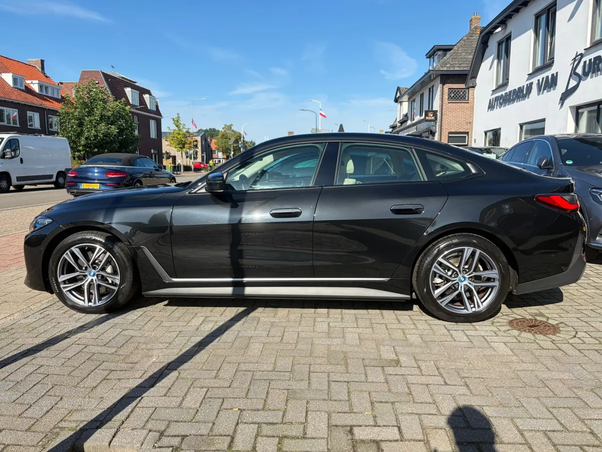 EDrive40 High Executive 84 kWh, NL-auto, SOH 96.6%, Lederen bekleding, Laser Lights,M-Stuur