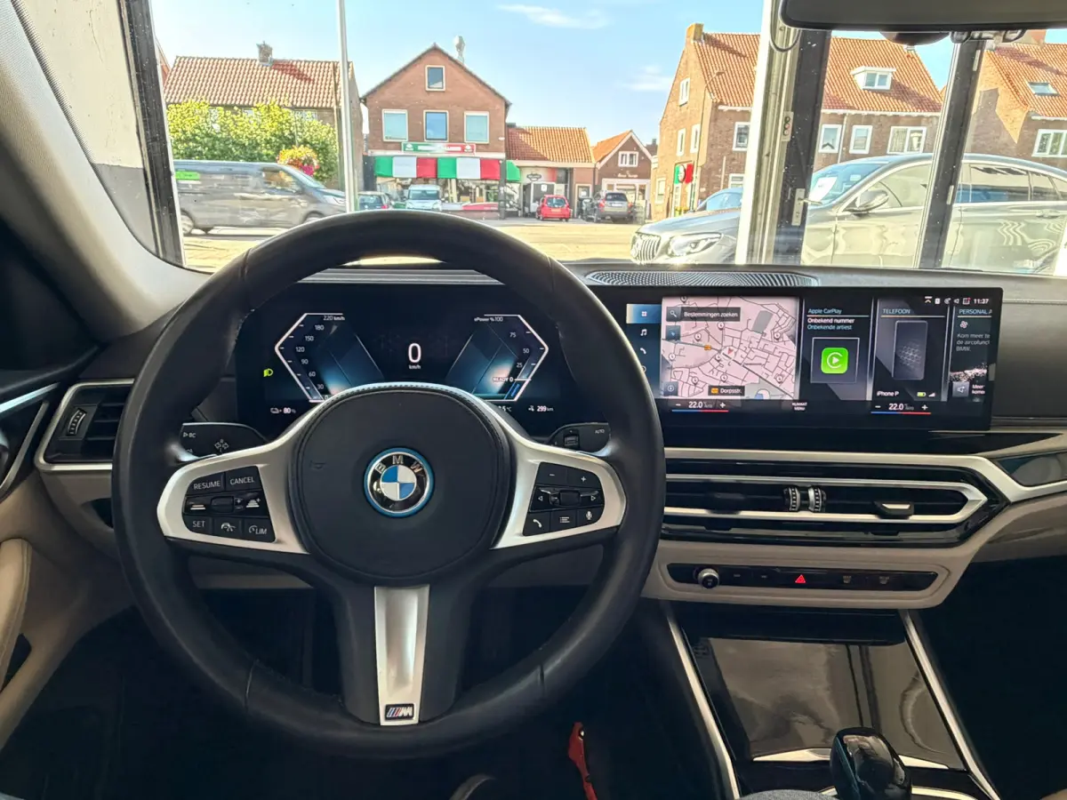 EDrive40 High Executive 84 kWh, NL-auto, SOH 96.6%, Lederen bekleding, Laser Lights,M-Stuur