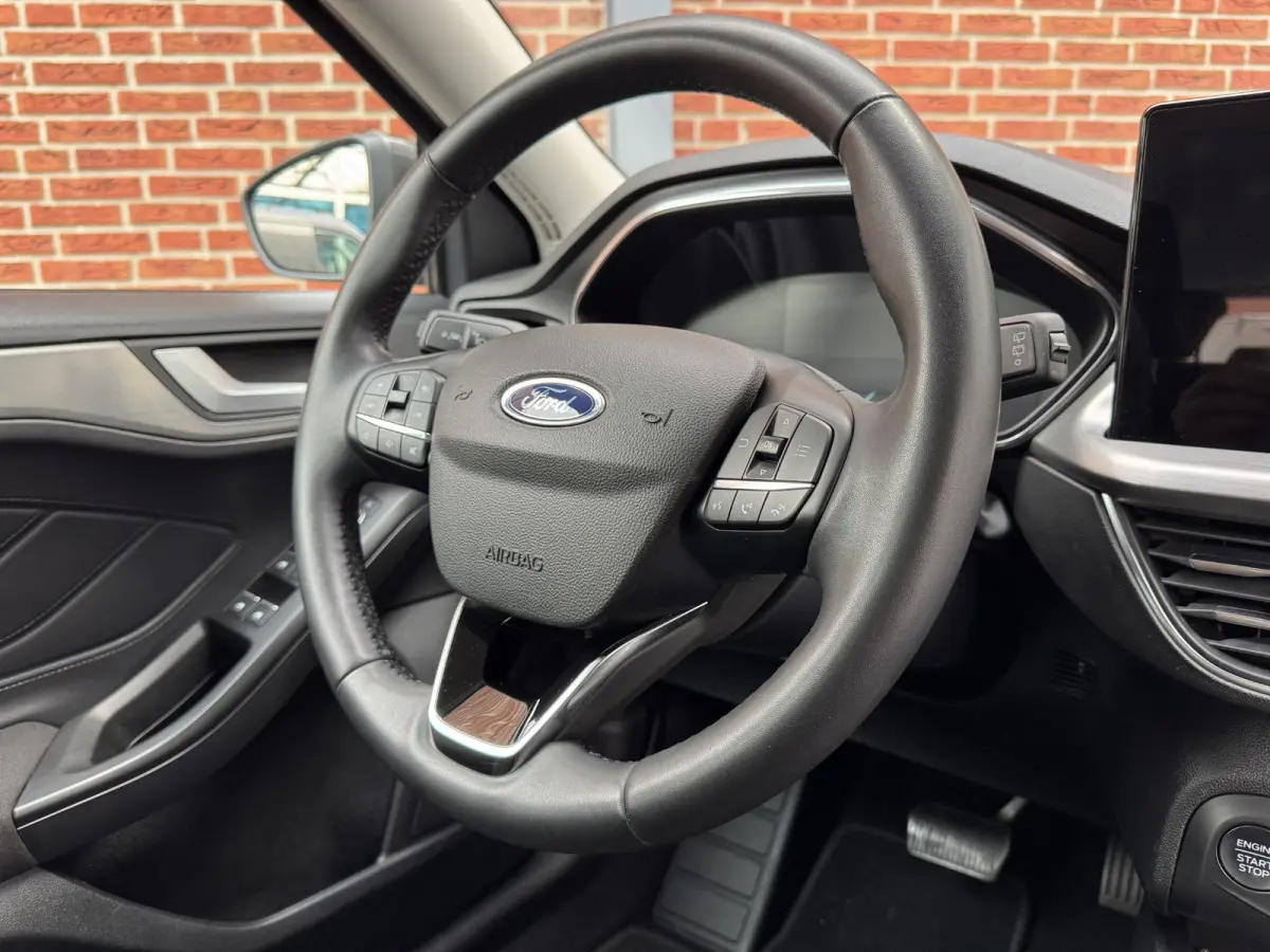 1.0 EcoBoost Hybrid Titanium | Stuur, Stoel en Voorruitverwarming | Cruise Control adaptief | Carplay/Andriod/Navi |
