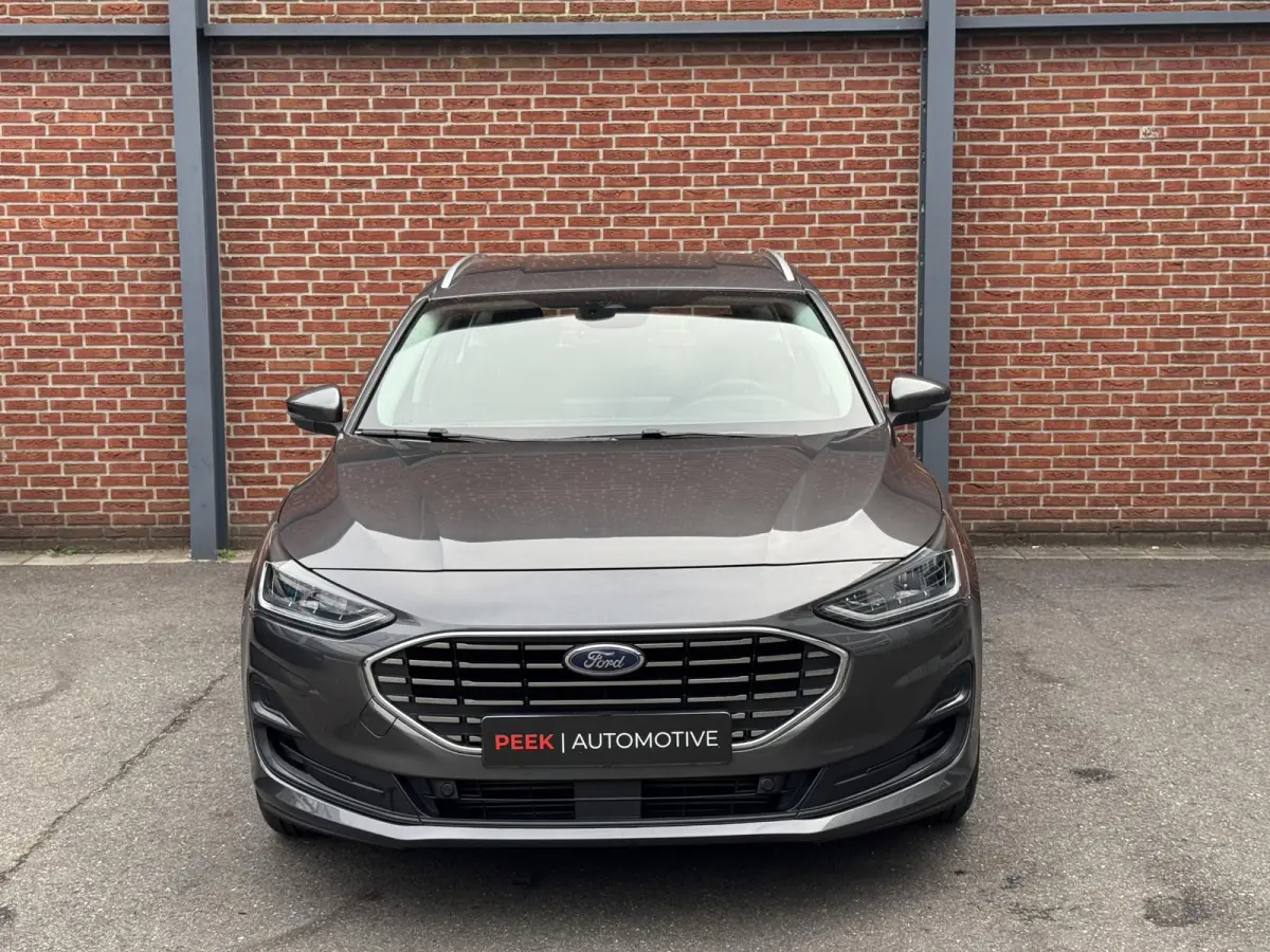 1.0 EcoBoost Hybrid Titanium | Stuur, Stoel en Voorruitverwarming | Cruise Control adaptief | Carplay/Andriod/Navi |