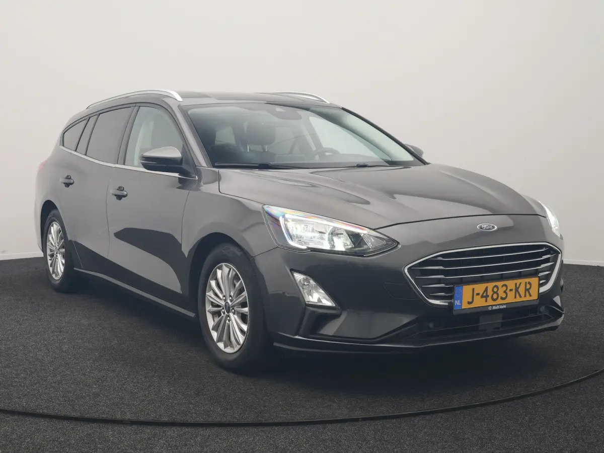 1.0 EcoBoost Hybrid Titanium Business 125pk | Camera | Apple Carplay | Keyless | Lane Assist | Elektrische Achterklep | Cruise Control | Virtual | Climate Control | Draadloze Telefoonlader |