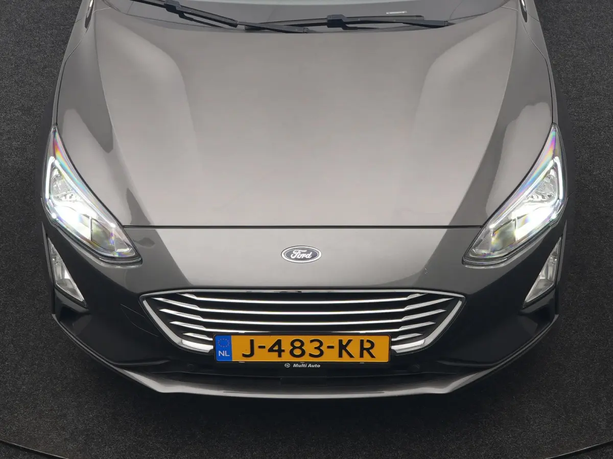 1.0 EcoBoost Hybrid Titanium Business 125pk | Camera | Apple Carplay | Keyless | Lane Assist | Elektrische Achterklep | Cruise Control | Virtual | Climate Control | Draadloze Telefoonlader |