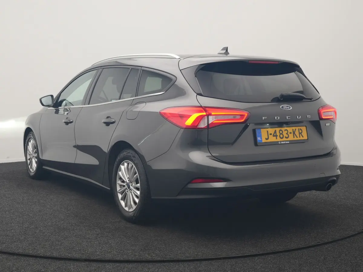 1.0 EcoBoost Hybrid Titanium Business 125pk | Camera | Apple Carplay | Keyless | Lane Assist | Elektrische Achterklep | Cruise Control | Virtual | Climate Control | Draadloze Telefoonlader |