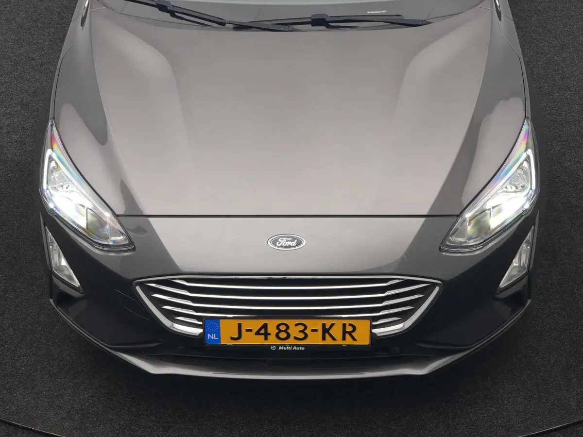 1.0 EcoBoost Hybrid Titanium Business 125pk | Camera | Apple Carplay | Keyless | Lane Assist | Elektrische Achterklep | Cruise Control | Virtual | Climate Control | Draadloze Telefoonlader |