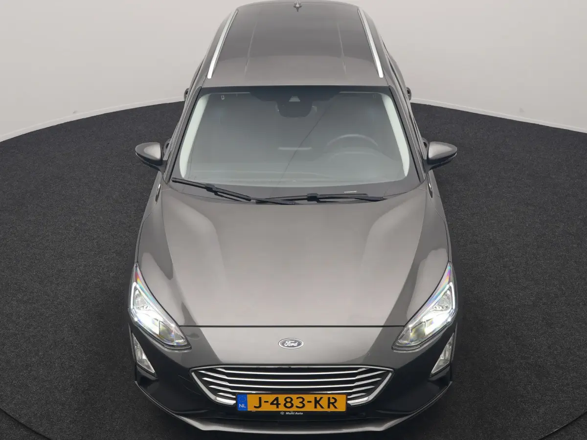 1.0 EcoBoost Hybrid Titanium Business 125pk | Camera | Apple Carplay | Keyless | Lane Assist | Elektrische Achterklep | Cruise Control | Virtual | Climate Control | Draadloze Telefoonlader |