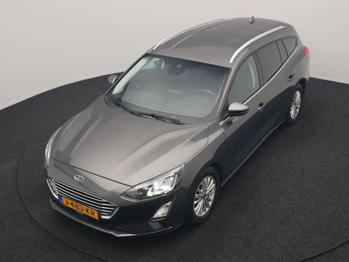 1.0 EcoBoost Hybrid Titanium Business 125pk | Camera | Apple Carplay | Keyless | Lane Assist | Elektrische Achterklep | Cruise Control | Virtual | Climate Control | Draadloze Telefoonlader |